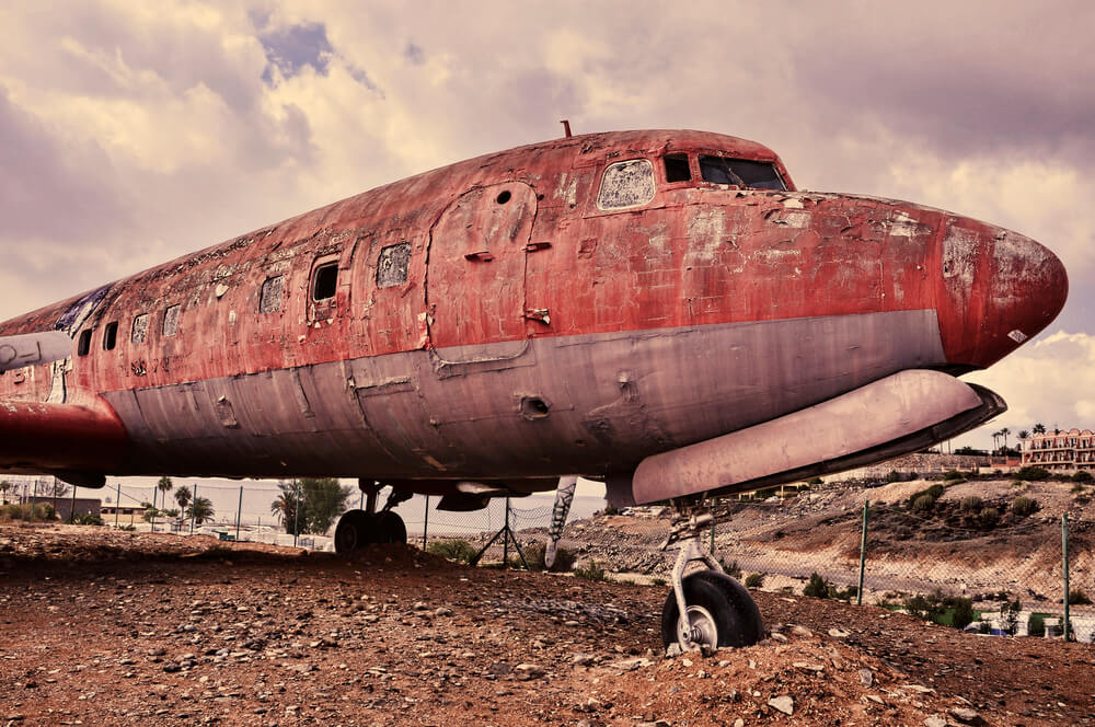 An old, weathered airplane on display under a cloudy sky, now featured in Afuzion news. | Afuzion